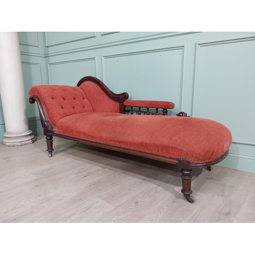 559 - 19th C. Carved mahogany and upholstered chaise longue on turned legs and castors. {80 cm H x 195 cm ... 