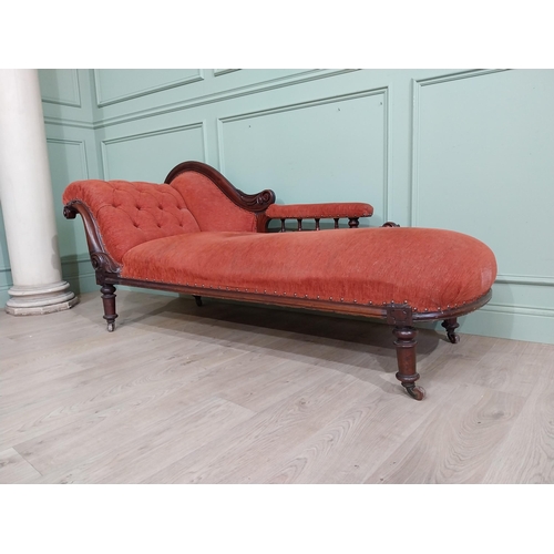 559 - 19th C. Carved mahogany and upholstered chaise longue on turned legs and castors. {80 cm H x 195 cm ... 