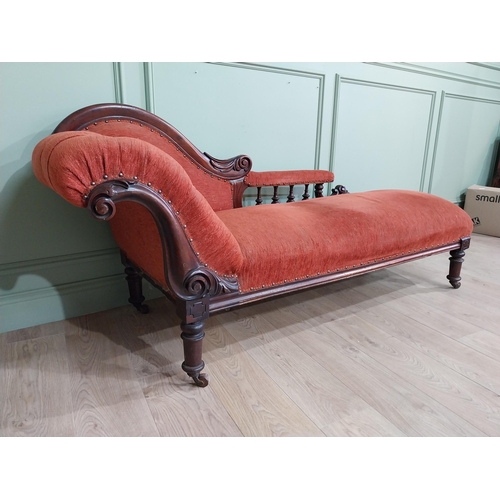 559 - 19th C. Carved mahogany and upholstered chaise longue on turned legs and castors. {80 cm H x 195 cm ... 