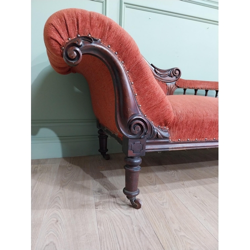 559 - 19th C. Carved mahogany and upholstered chaise longue on turned legs and castors. {80 cm H x 195 cm ... 