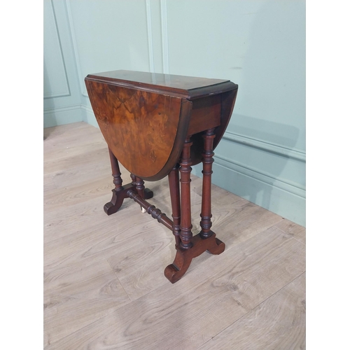 561 - Victorian burr walnut Sunderland table on turned supports and single turned stretcher. {53 cm H x 53... 