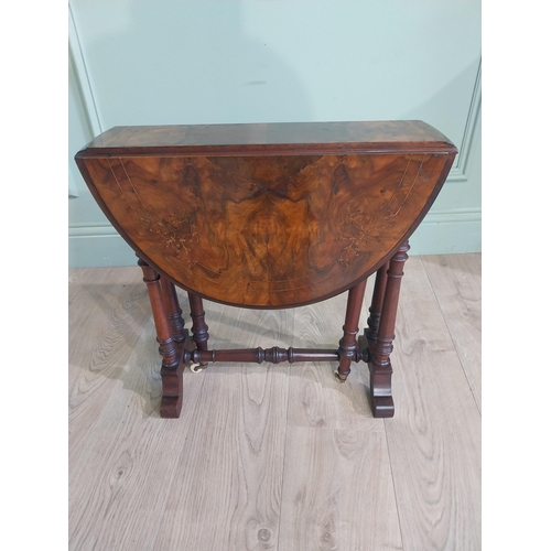 561 - Victorian burr walnut Sunderland table on turned supports and single turned stretcher. {53 cm H x 53... 