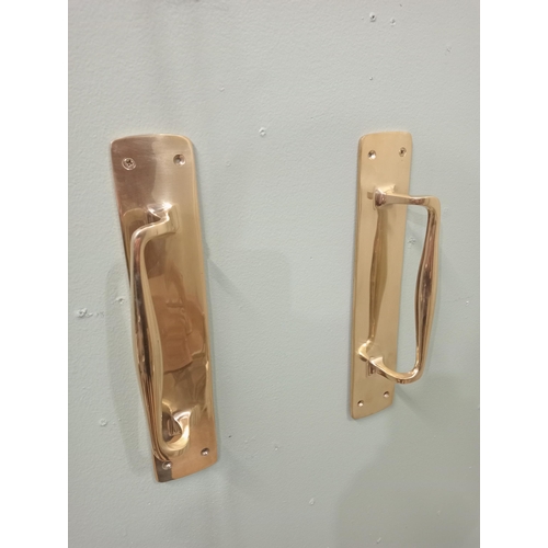 574 - Pair of solid brass door handles. {H 31cm x W 7cm x D 5cm}.  NOT AVAILABLE TO VIEW IN PERSON