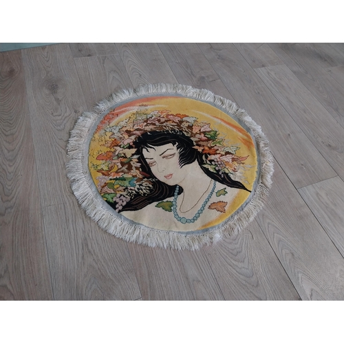 575 - Decorative Oriental circular rug. {64 cm Dia}.