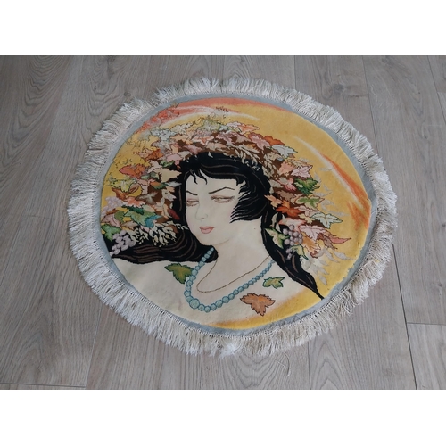 575 - Decorative Oriental circular rug. {64 cm Dia}.