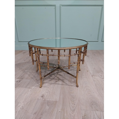 58 - Good quality gilded metal faux bamboo table with mirrored top in the Maison Jansen style. {44 cm H x... 