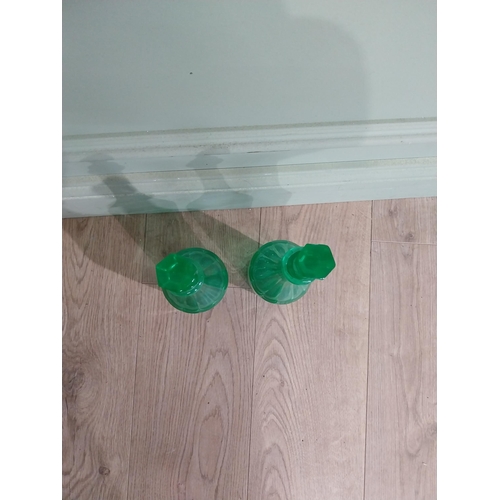 585 - Two green glass decanters. {33 cm H x 7 cm Dia.}.