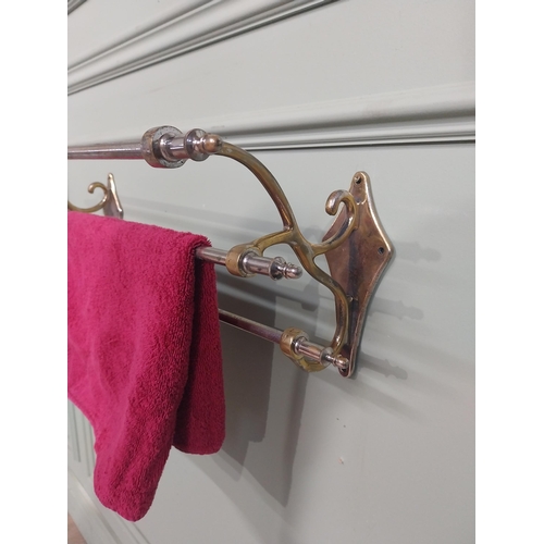 59 - Early 20th C. Brass and chrome wall mounted towel rail. {21 cm H x 62 cm W  x 18 cm D}.