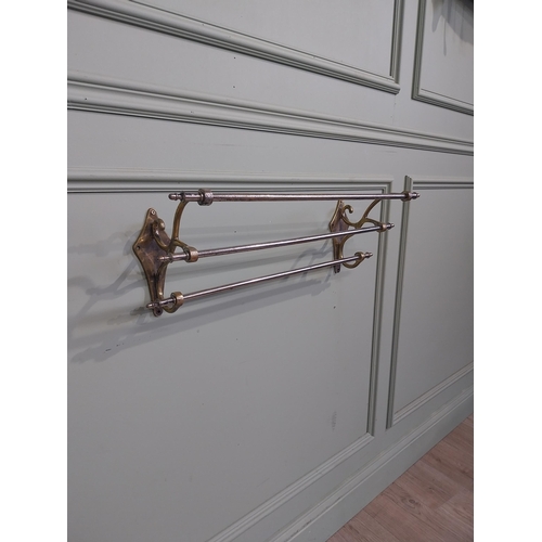 59 - Early 20th C. Brass and chrome wall mounted towel rail. {21 cm H x 62 cm W  x 18 cm D}.