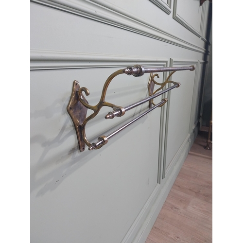 59 - Early 20th C. Brass and chrome wall mounted towel rail. {21 cm H x 62 cm W  x 18 cm D}.