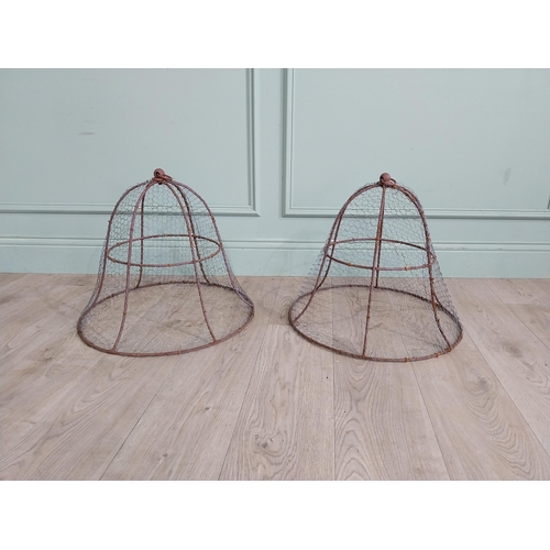 590 - Pair of wrought iron cloches. {47 cm  H x 44 cm Dia.}.