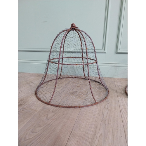 590 - Pair of wrought iron cloches. {47 cm  H x 44 cm Dia.}.