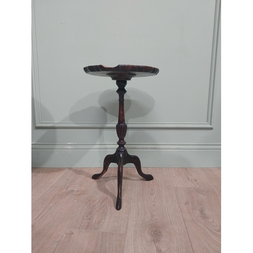 592 - Two Edwardian mahogany wine tables on turned columns and three outswept feet. {53 cm H x 31 cm Dia} ... 