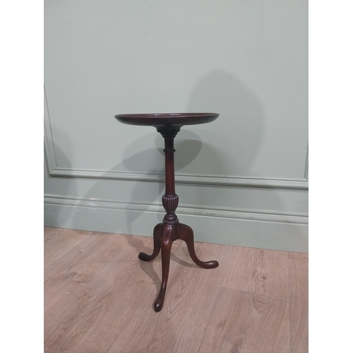 592 - Two Edwardian mahogany wine tables on turned columns and three outswept feet. {53 cm H x 31 cm Dia} ... 