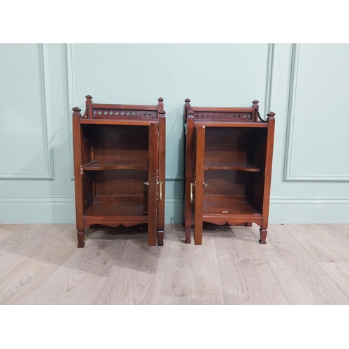 594 - Pair of Edwardian mahogany cabinets with single mirrored doors. {64 cm Hx  36 cm W x 24 cm W}.