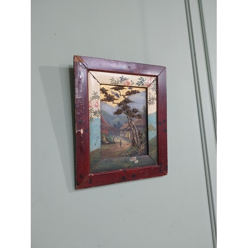 596 - 19th C. Oriental oil on board � Village Scene mounted in lacquered frame. {55 cm H x 46 cm W}.