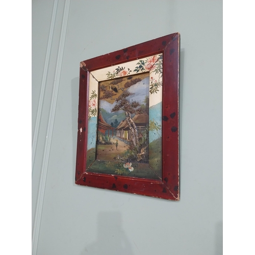 596 - 19th C. Oriental oil on board � Village Scene mounted in lacquered frame. {55 cm H x 46 cm W}.