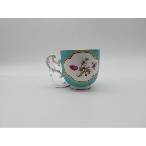 626 - 20th C. Meissen tea cup decorated with two gilt edged cartouches with hand painted floral decoration... 