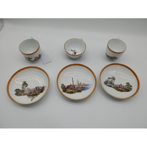 629 - Pair of early 19th C. Meissen Chocolate cups and saucers decorated with elaborate gilt borders, rura... 