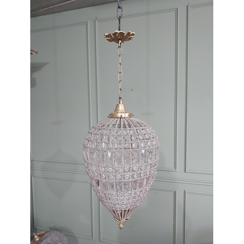 64 - French brass and cut crystal tear drop chandelier. {80 cm H x 29 cm Dia.}.