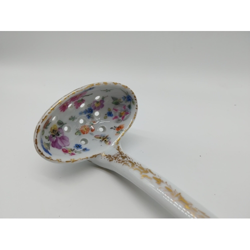 643 - 19th C. Meissen gilded serving spoon decorated with hand painted flowers. {20 cm L} and Meissen gild... 