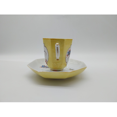 645 - 20th C. Meissen two handled yellow ground cup {8 cm H x 6.5 cm Dia.}  and saucer {13.5 cm Dia.} deco... 