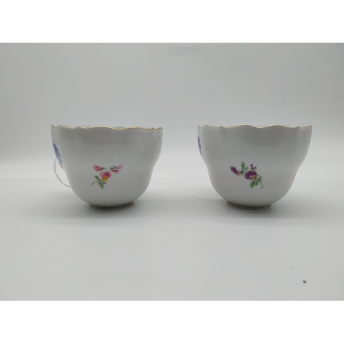 652 - Pair of 20th C. Meissen tea cups {7 cm H x 9 cm Dia}. Decorated with hand painted flowers with no. 0... 