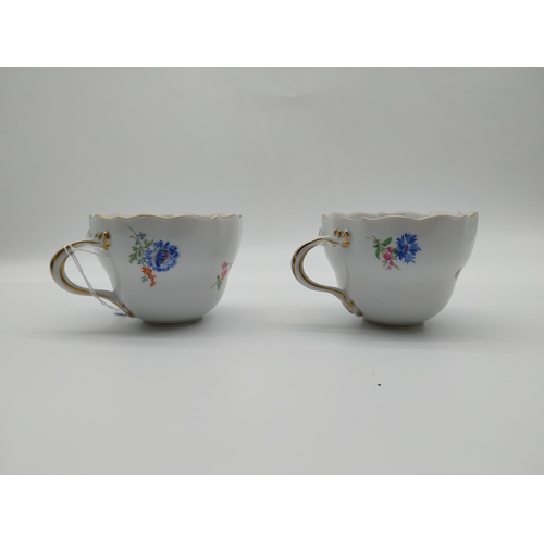 652 - Pair of 20th C. Meissen tea cups {7 cm H x 9 cm Dia}. Decorated with hand painted flowers with no. 0... 