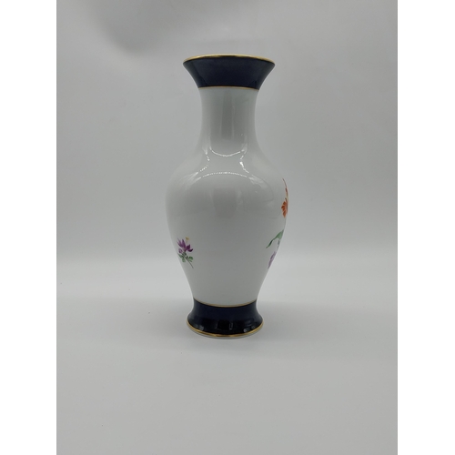 659 - 20th C. Meissen gilded blue ground and white vase decorated with hand painted bouquet of flowers. Un... 