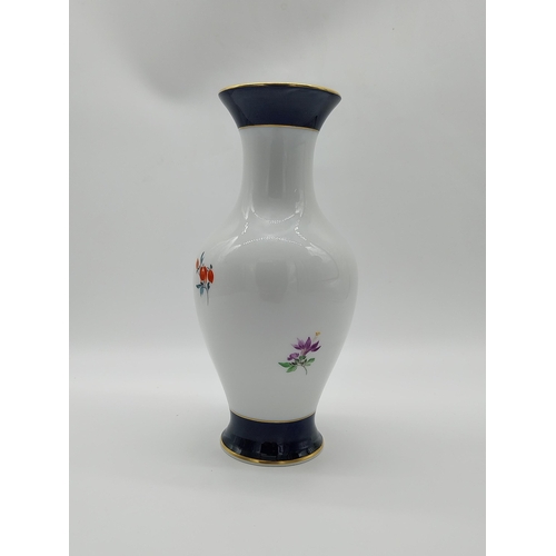 659 - 20th C. Meissen gilded blue ground and white vase decorated with hand painted bouquet of flowers. Un... 