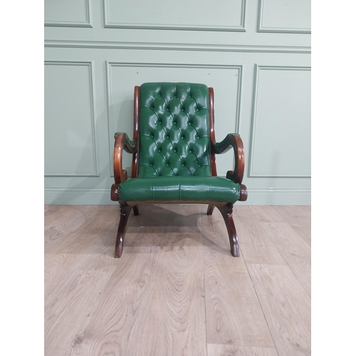 66 - 1950�s mahogany and leather upholstered armchair on lyre supports. {90 cm H x 63 cm W x 90 cm DD}.