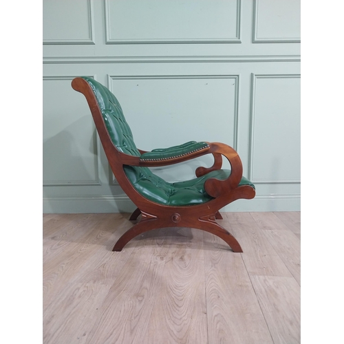 66 - 1950�s mahogany and leather upholstered armchair on lyre supports. {90 cm H x 63 cm W x 90 cm DD}.