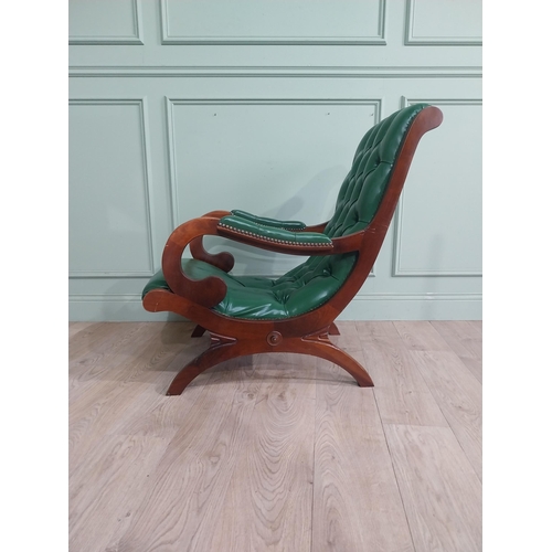 66 - 1950�s mahogany and leather upholstered armchair on lyre supports. {90 cm H x 63 cm W x 90 cm DD}.