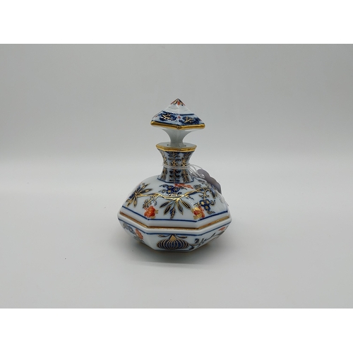 660 - 19th C. Meissen gilded perfume bottle with stopper in octagonal form decorated with hand painted flo... 