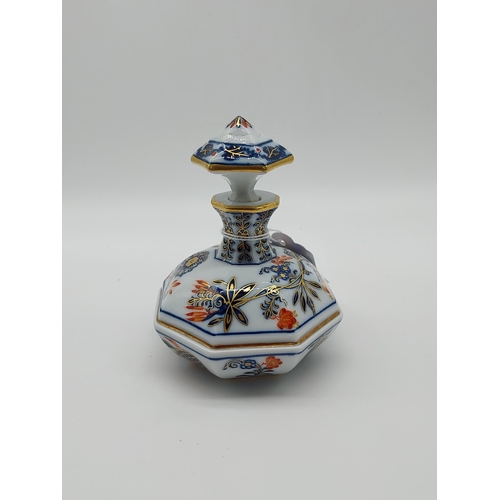 660 - 19th C. Meissen gilded perfume bottle with stopper in octagonal form decorated with hand painted flo... 