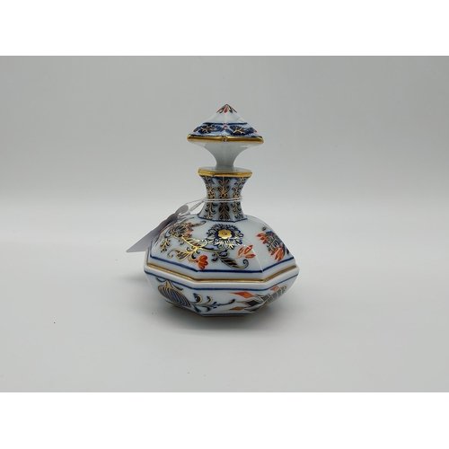 660 - 19th C. Meissen gilded perfume bottle with stopper in octagonal form decorated with hand painted flo... 