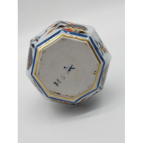 660 - 19th C. Meissen gilded perfume bottle with stopper in octagonal form decorated with hand painted flo... 