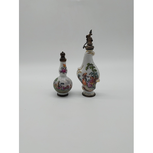 661 - Two 20th C.  Meissen gilded perfume bottles decorated with hand painted scenes. {12.5 cm H} and {9cm... 