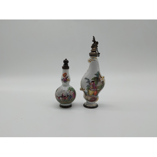 661 - Two 20th C.  Meissen gilded perfume bottles decorated with hand painted scenes. {12.5 cm H} and {9cm... 