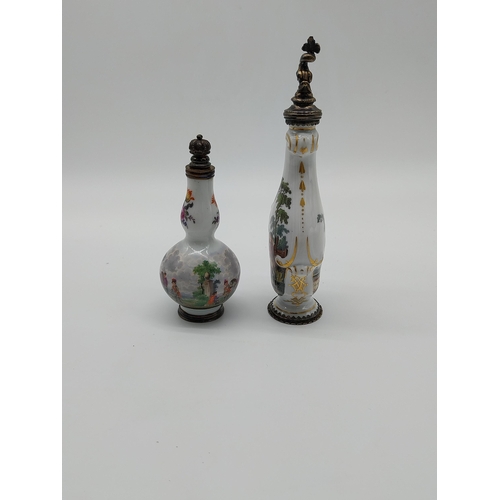 661 - Two 20th C.  Meissen gilded perfume bottles decorated with hand painted scenes. {12.5 cm H} and {9cm... 