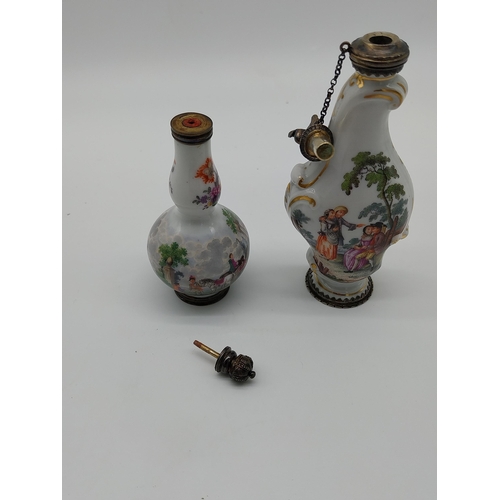 661 - Two 20th C.  Meissen gilded perfume bottles decorated with hand painted scenes. {12.5 cm H} and {9cm... 