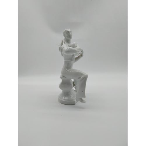 664 - 20th C. Meissen Figure. � �The Spanish Guitar Player� on a curved base with No. A1191 and another nu... 