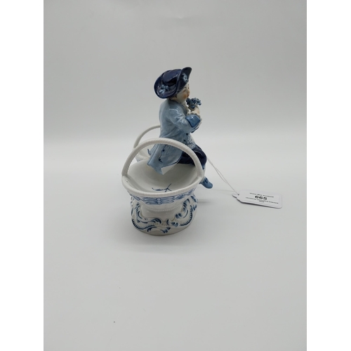 665 - 20th C. Meissen porcelain figural table salts, � Boy sitting between loop-handle baskets, on shaped ... 