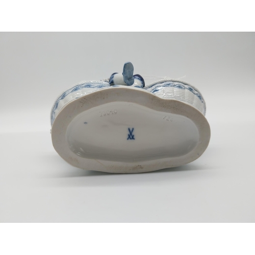 665 - 20th C. Meissen porcelain figural table salts, � Boy sitting between loop-handle baskets, on shaped ... 