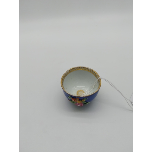 670 - 19th C. Meissen cobalt blue cup gilded with embossed flowers. {3 cm H  4.5 cm Dia.}. Underglazed wit... 