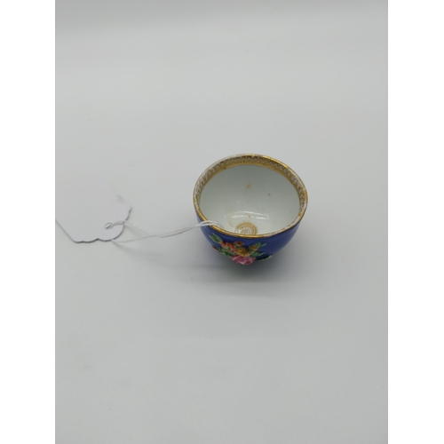 670 - 19th C. Meissen cobalt blue cup gilded with embossed flowers. {3 cm H  4.5 cm Dia.}. Underglazed wit... 