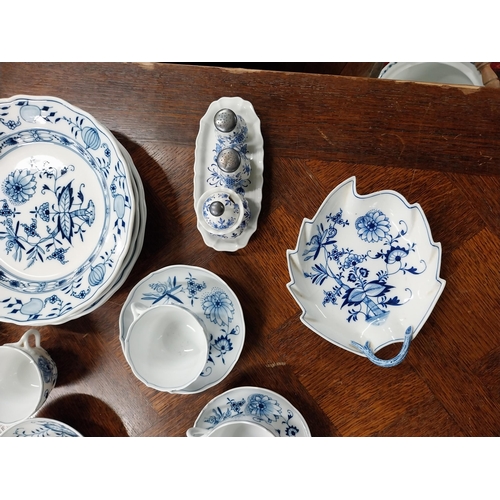 678 - Eighty piece 20th C. Meissen blue and white Onion Pattern dinner and tea set. Underglazed with blue ... 