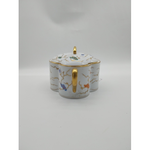 682 - Ceramic lidded tureen gilded and decorated with flowers. { 14.5 cm H x 20 cm W}.