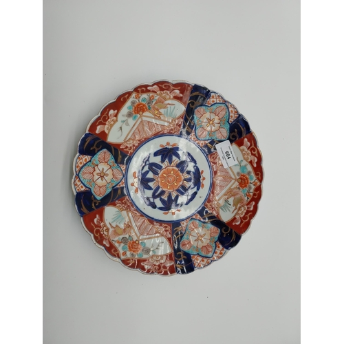 684 - Imari oriental ceramic plate. {26 cm Dia.}.