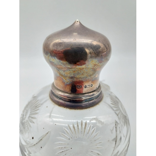 688 - 20th C. Cut glass perfume bottle with original glass stopper with English London silver hallmark 193... 